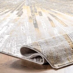 6'7"x9' Amaya Abstract Area Rug Gold - NuLOOM -Nuloom GUEST 56171e20 a903 4817 8829 d9aba358b3e5