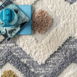 Kirsty Colorful Checkers Kids Tassel Area Rug -Nuloom GUEST ca49fc72 387a 468d b953 336d9da61759