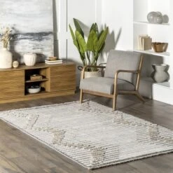NuLOOM Amara Geometric High/Low Tasseled Area Rug