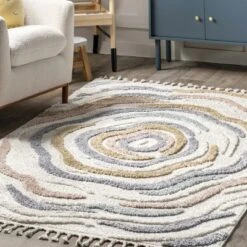 NuLOOM Adette Abstract Swirl Kids Tassel Area Rug -Nuloom GUEST f513bac3 cc89 4f5f af69 ceae737a6869
