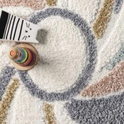 Theodora Colorful Swirl Kids Tassel Area Rug 13 Theodora Colorful Swirl Kids Tassel Area Rug -Nuloom GUEST fcf6084c b223 49a0 95d2 c926dd45af18